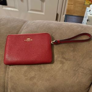Small coach wristlet pouch.